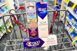 crest brilliance and gum toothpaste in a cart