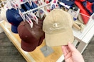 hand holding champion corduroy hat at target