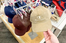hand holding champion corduroy hat at target