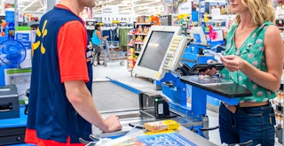 a person checking out at walmart