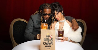 cardi b and offset at table with mcdonalds