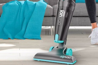 someone using the Tzumi Upright Dry Zip Vacuum