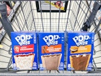 three boxes of pop-tarts in a walgreens cart