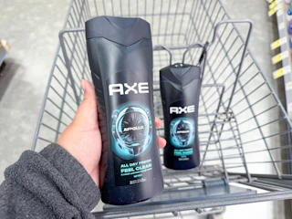 hand holding axe body wash and one axe body wash in walgreens cart