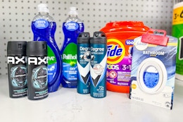 axe body spray, palmolive dish soap, degree deodorant, tide pods, and febreze air freshener on a shelf