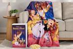 Disney VHS blanket on a couch