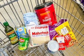 a cart full of grocery items