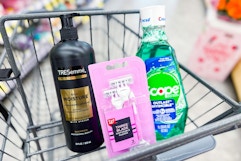 tresemme shampoo, walgreens razors, and scope mouthwash in a cart