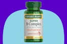 Nature's Bounty Super B Complex Vitamins with Vitamin C & Folic Acid on a blue background.