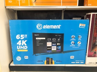 65" tv box on store shelf