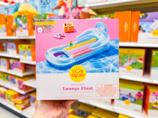 hand holding a Sun Squad pool float at Target