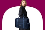 Model wearing a blue weekender bag