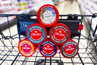 old spice hair pomades in a triangle in a cart