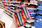 hand holding 2 bottles of bodyarmor sports drinks at target