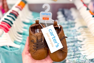 kids' sneakers sitting on a target shelf