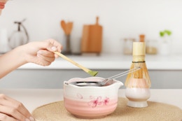 person using kit to make matcha