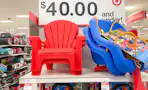 little tikes chair and swing sitting on a target shelf