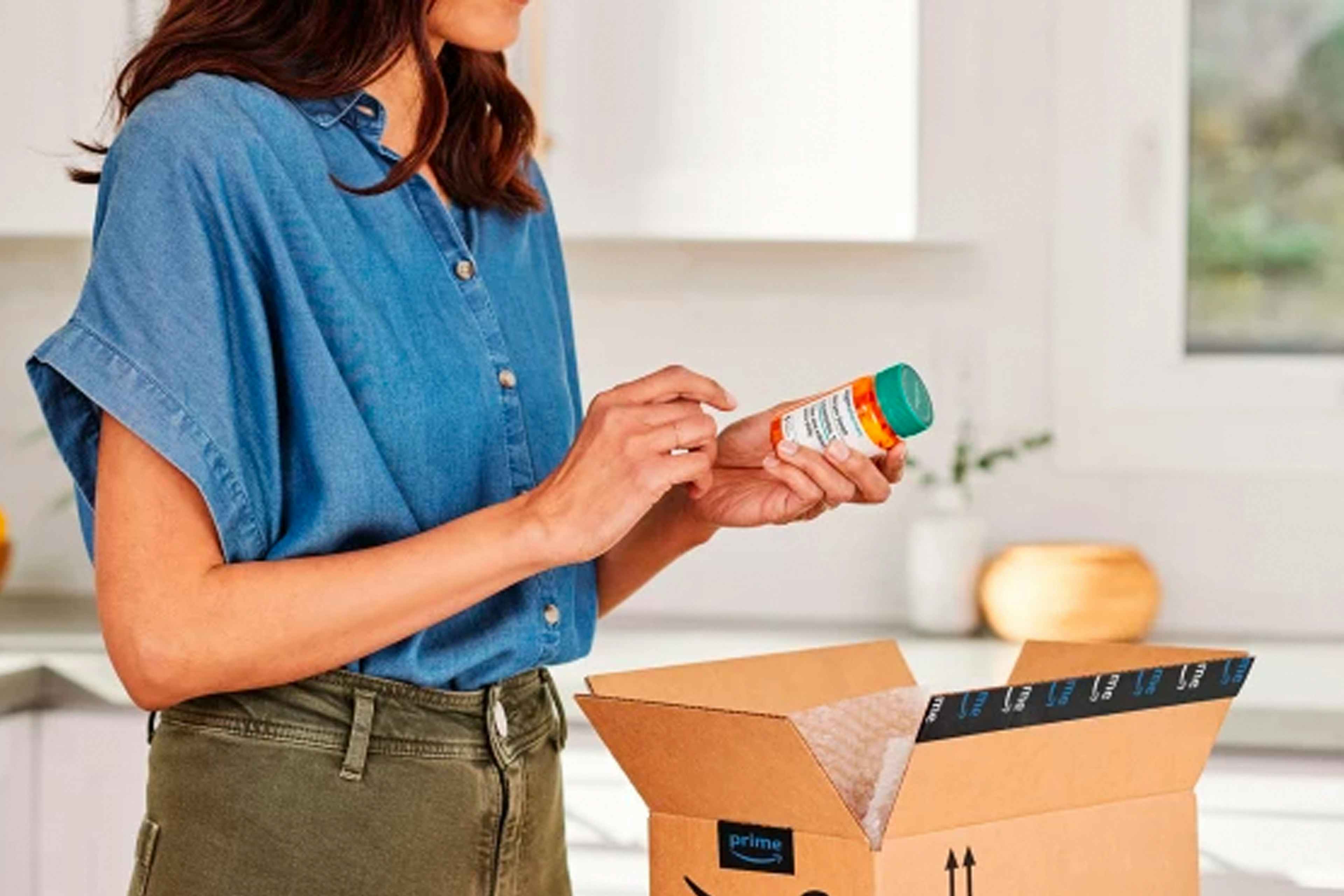 Woman looking at an pill bottle from amazon