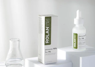 a bottle of facial serum on a display