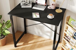 a small desk against a wall