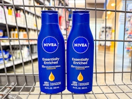two nivea lotion bottles in a shopping cart