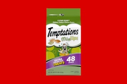 temptations cat treats on a red background