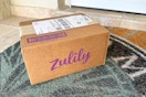 a zulily box sitting on a front porch
