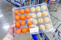 hand holding a tray of members mark pumpkin spice cake balls