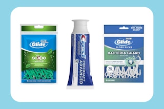 two packs of oral b flossers and one tube of crest toothpaste