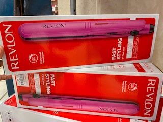 revlon flat irons next to each other in the box