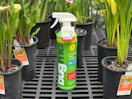 BugMC Spray next to plants in Walmart's garden section