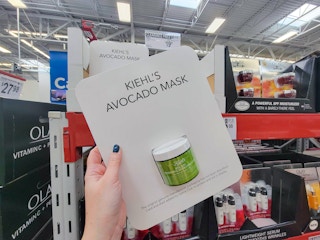 hand holding a kiehls avocado mask