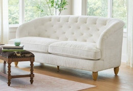 white tufted sofa