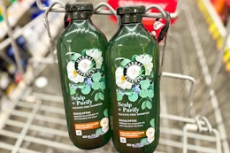 2 bottles of herbal essences shampoo in a cart