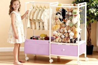 a girl near a clothing rack