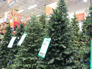 black friday christmas tree deals - Artificial Christmas trees on display at Home Depot.