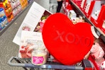 valentine's day home items in an aldi shopping cart
