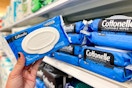 hand holding a pack of cottonelle wet wipes at target
