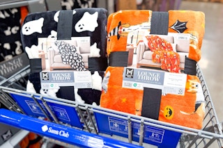 2 halloween throw blankets in a sam's club cart