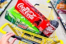 soda products stacked in a dollar general shopping cart