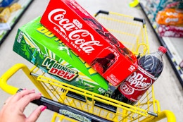 soda products stacked in a dollar general shopping cart