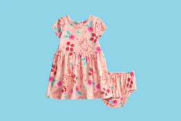 peppa pig baby dress on a blue background