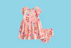 peppa pig baby dress on a blue background