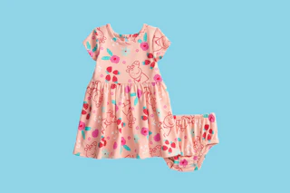 peppa pig baby dress on a blue background