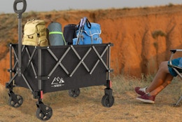 a wagon full of camping supplies outside