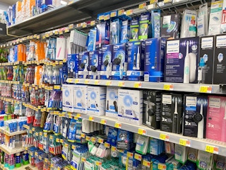 Electric toothbrushes and supplies on display at Walmart