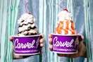 Two people holding a Carvel sundae in one hand.