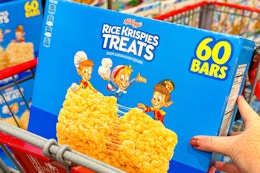 hand grabbing a box of kellogg's rice krispies treats