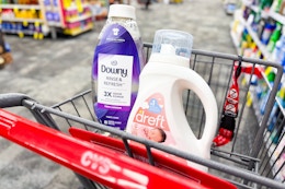 dreft and downy laundry items in a cart
