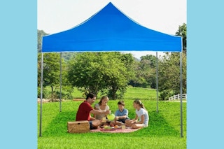 people sitting under a canopy